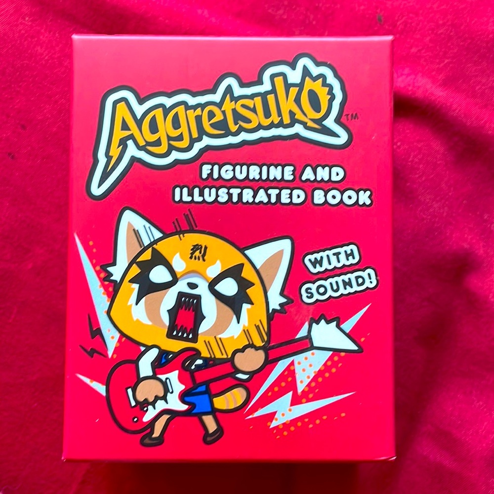 NWT Aggretsuko Figurine and Book Collectible